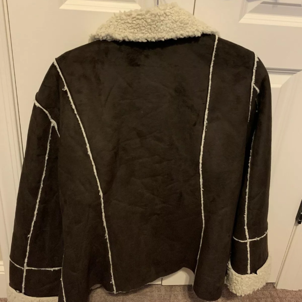 Quilted jacket. It is cozy with the inner cotton